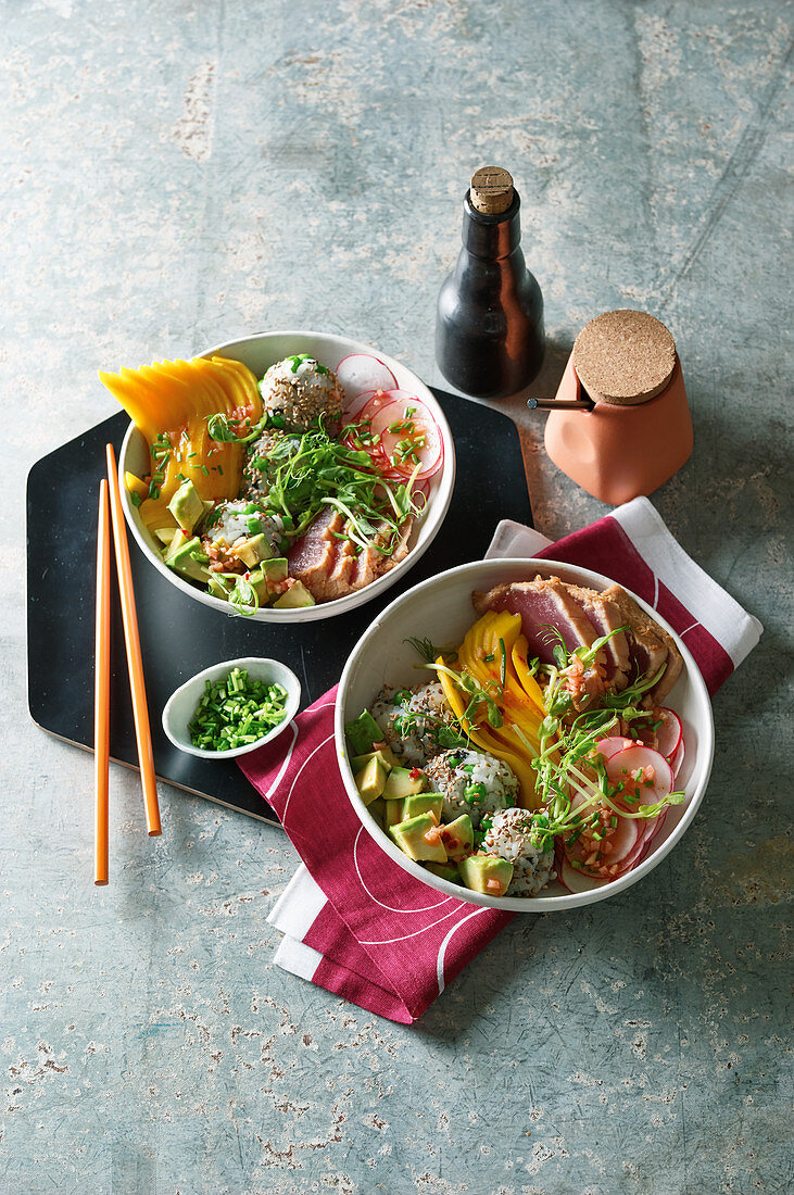 Sushi bowl with tuna, rice balls and avocado