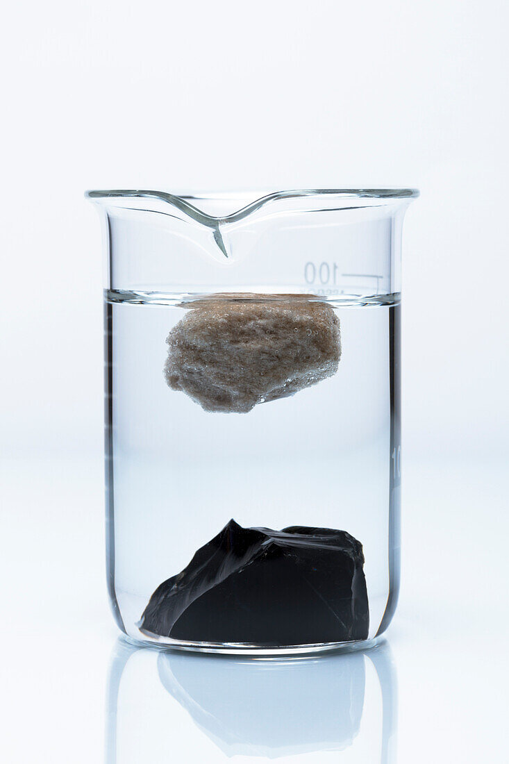 Obsidian and pumice in water