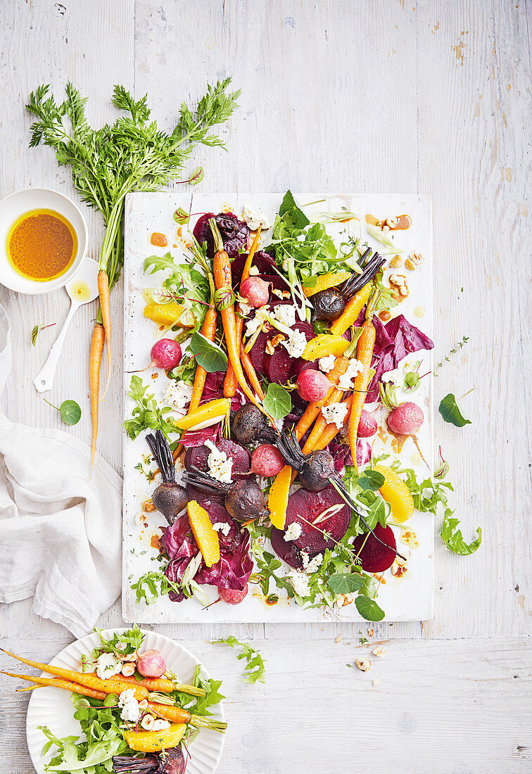 Beet, carrot and feta with orange and hazelnuts