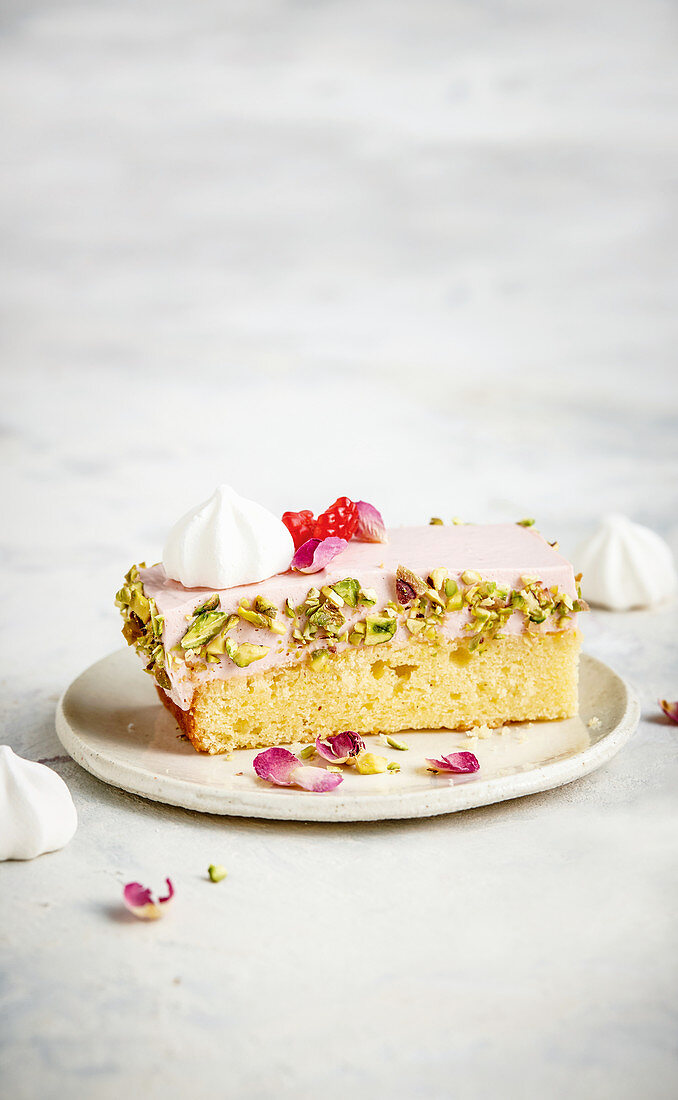 Vanilla cake with raspberry rosewater cheesecake topping