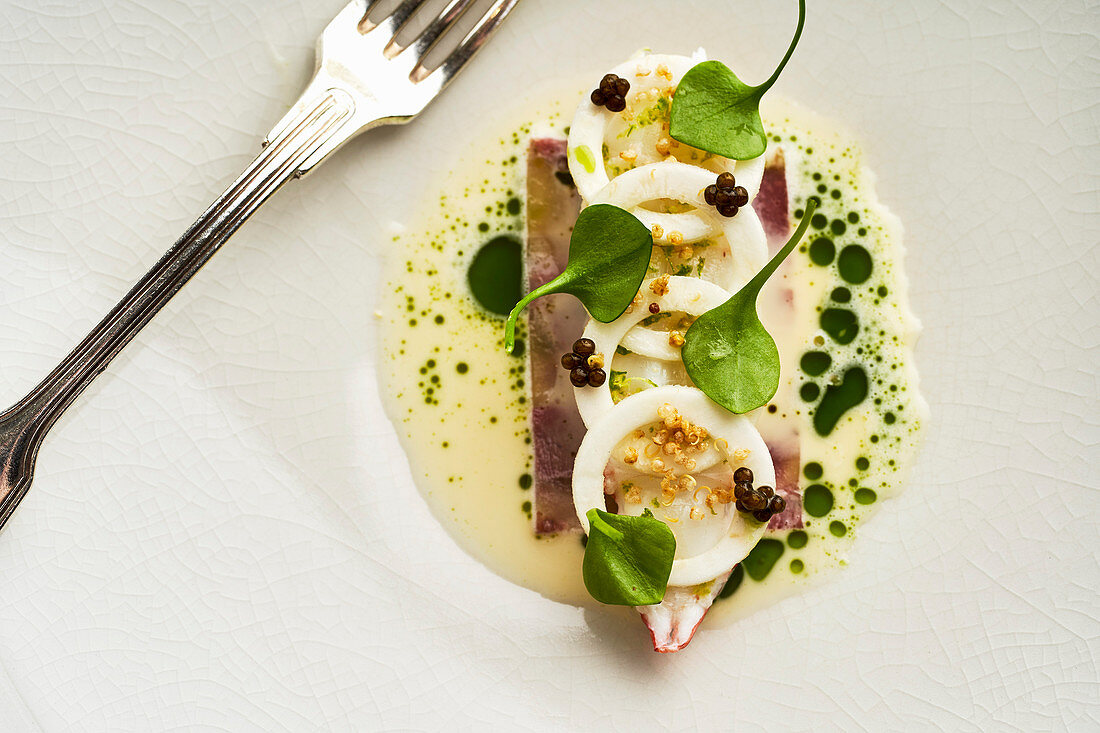 Veal head with langoustine and herb espuma
