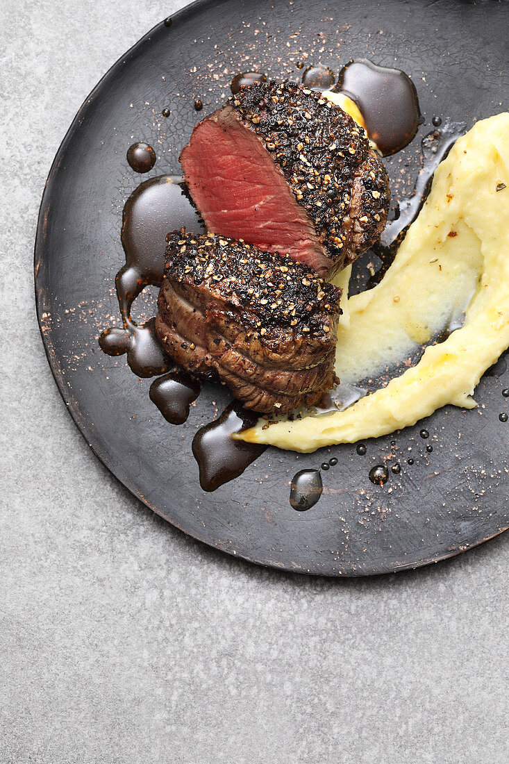 French pepper steak with mashed potatoes