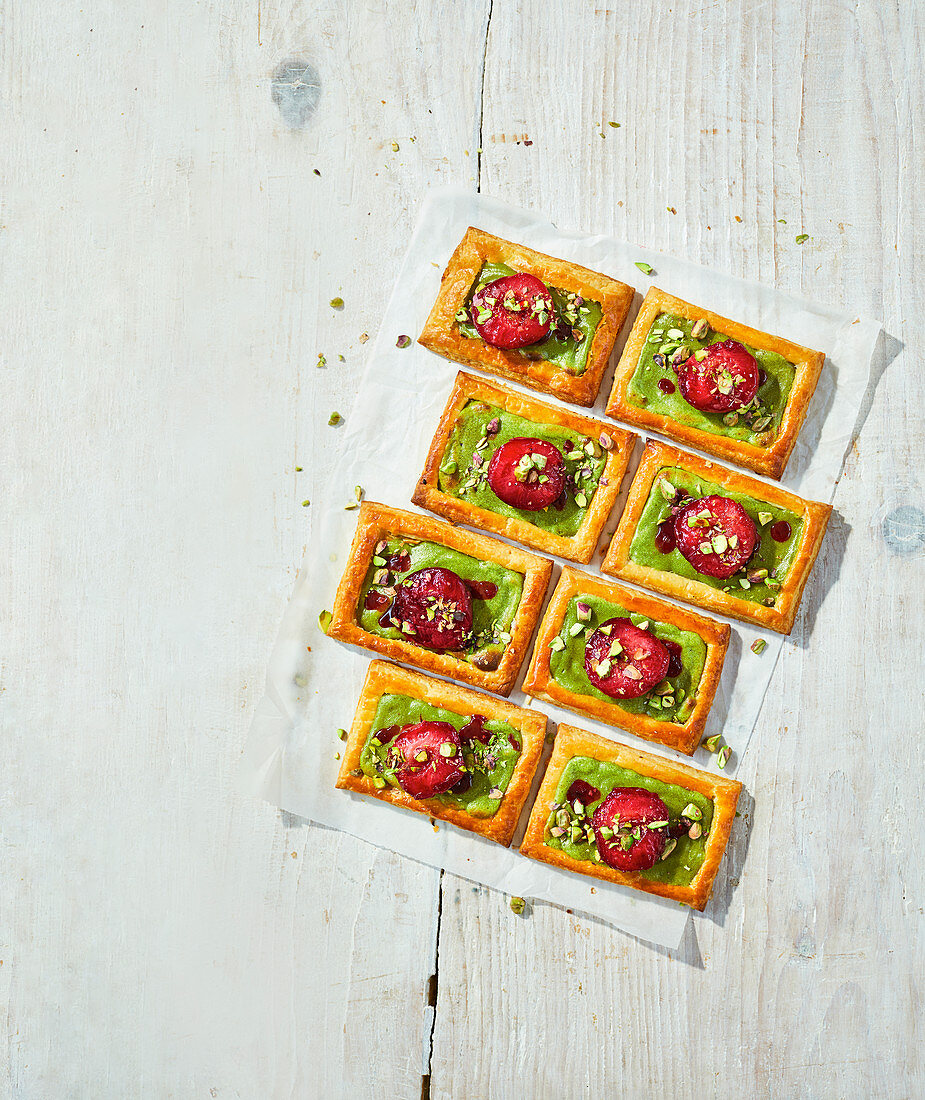 Roasted plum and pistachio custard pastries