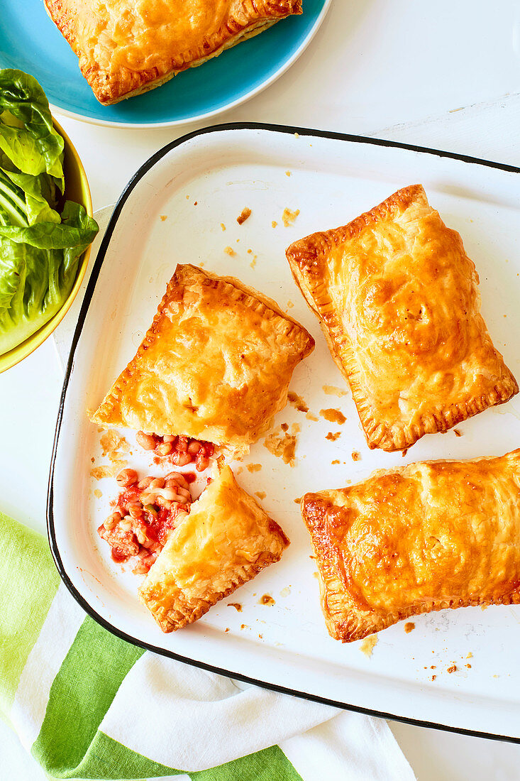 Cheesy sausage and bean pies