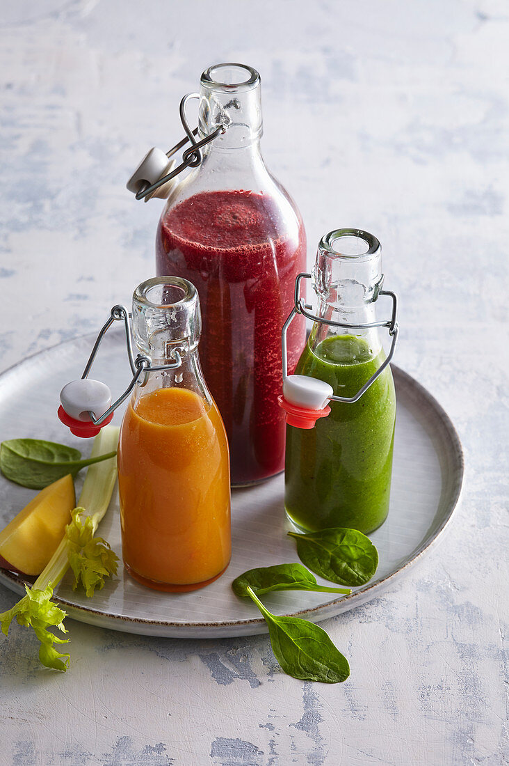 Green, red and yellow smoothies