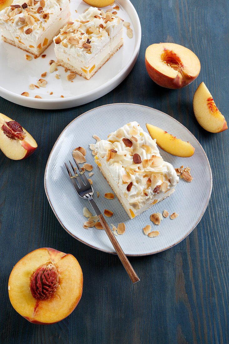 Creamy pie with peach pieces and almonds