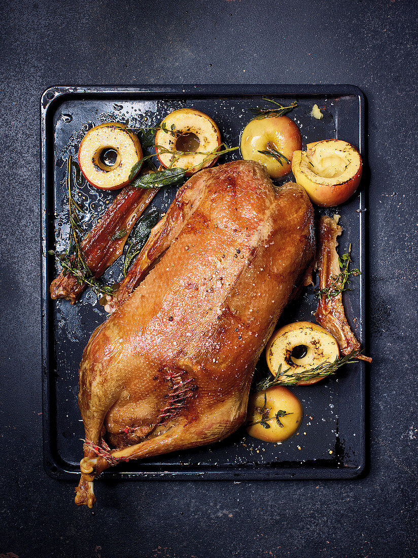 Stuffed roast goose with baked apples