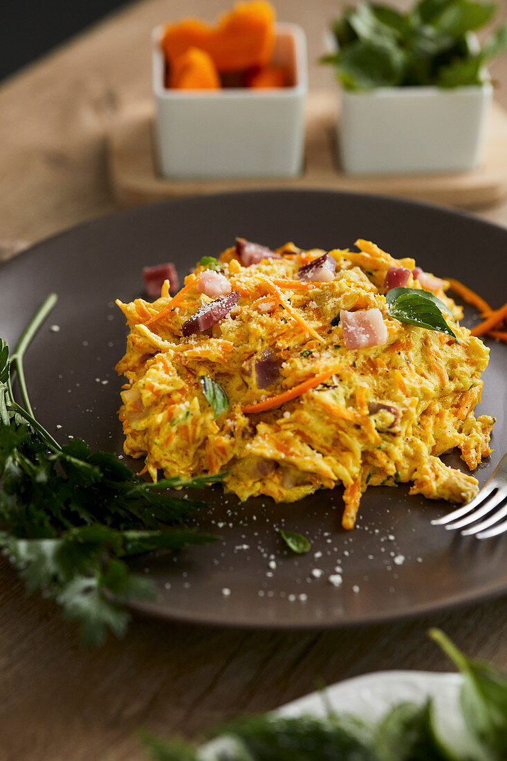Raw pumpkin noodles with pancetta and cooking cream