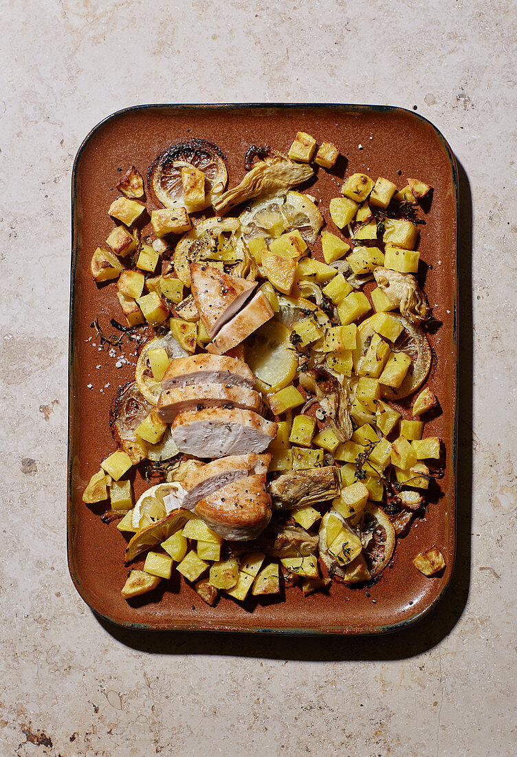 Lemon chicken with artichokes and potatoes