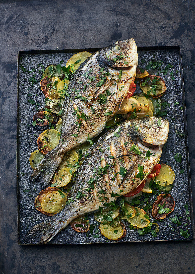 Turkish sea bream on a bed of potatoes