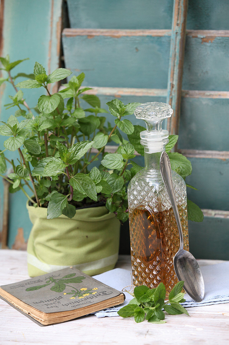 Mint syrup in a crystal carafe