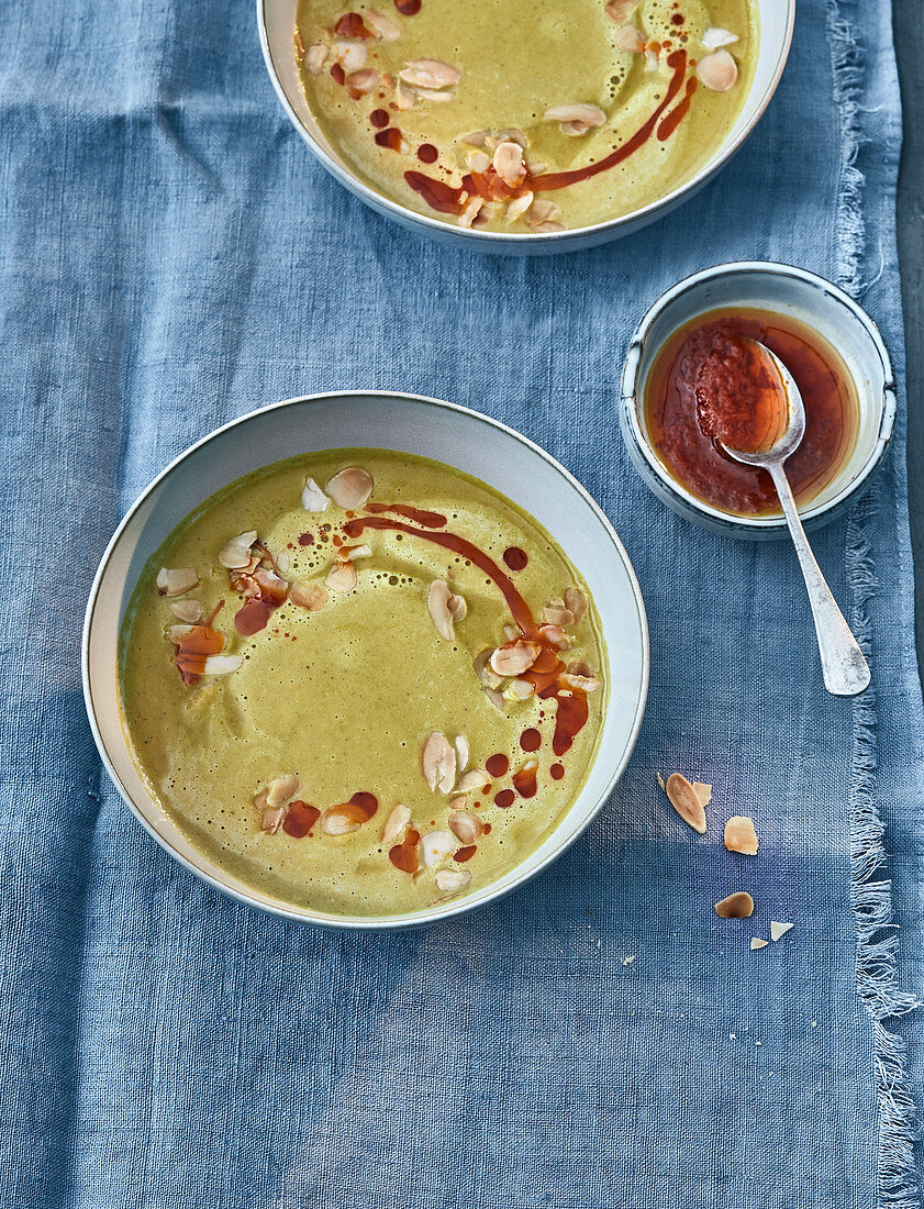 Chickpea and potato soup with almond mousse and harissa oil