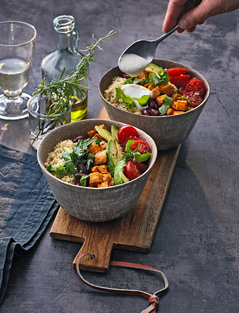 Quinoa bowls with sweet potatoes and sour cream