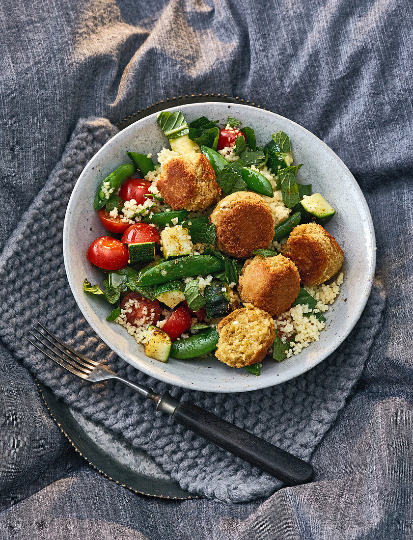 Couscous with vegetables, falafel and sheep's cheese