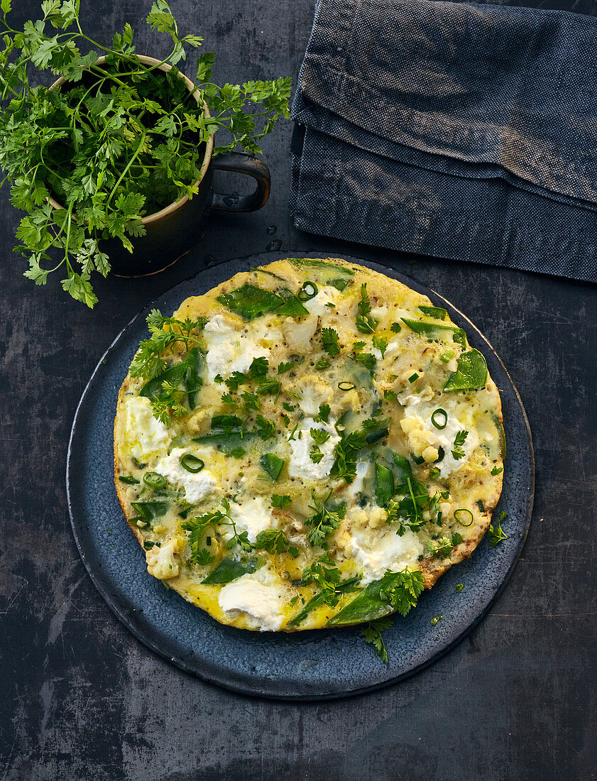 Vegetable omelette with ricotta and parsely