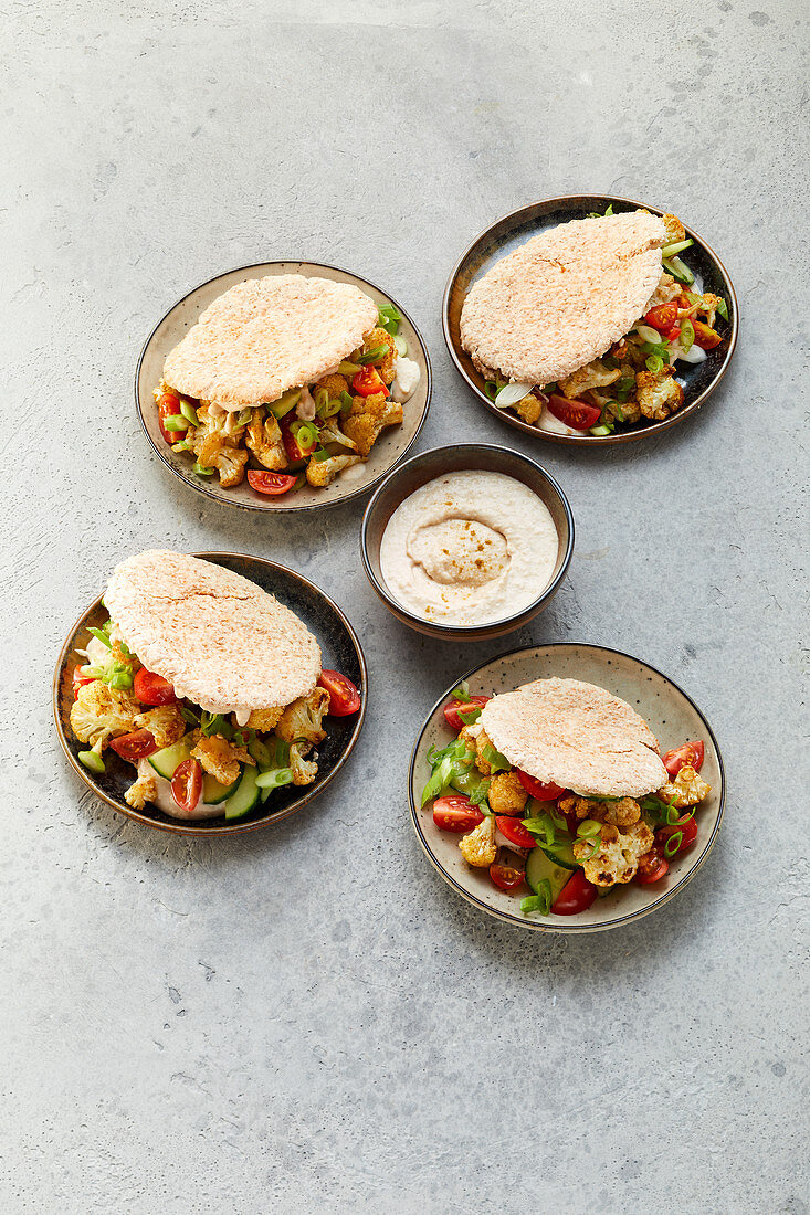 Roasted cauliflower with a white bean hummus and pita bread