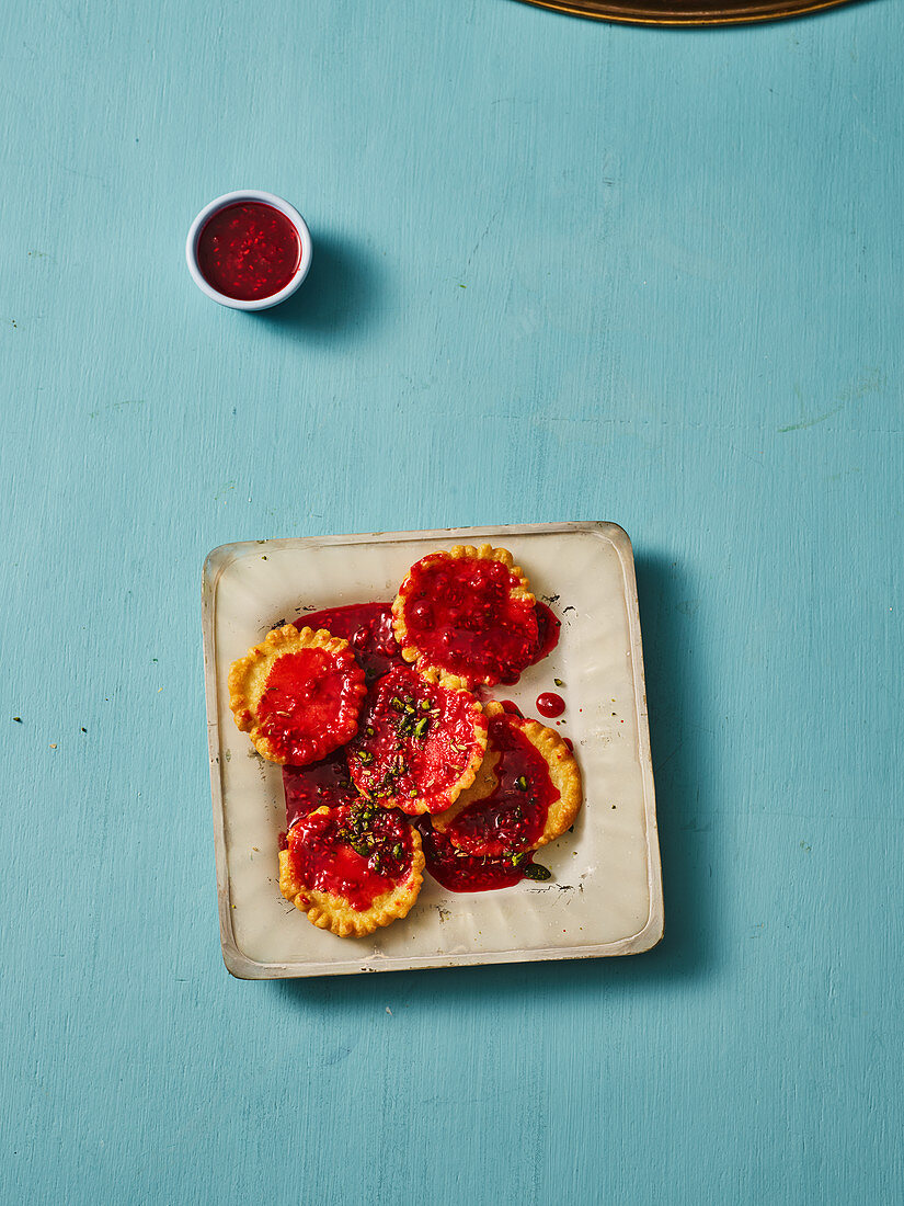 Indian pancakes with raspberry syrup