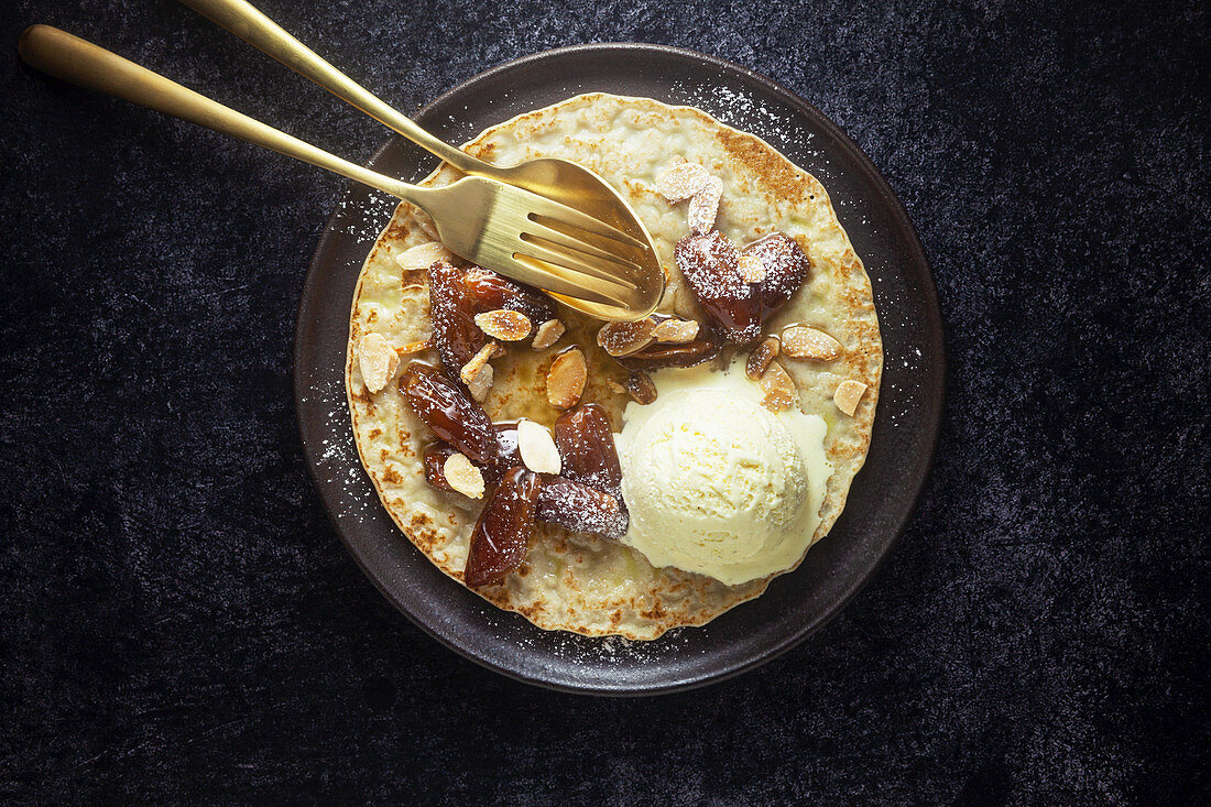 Pancakes with vanilla ice cream and dates