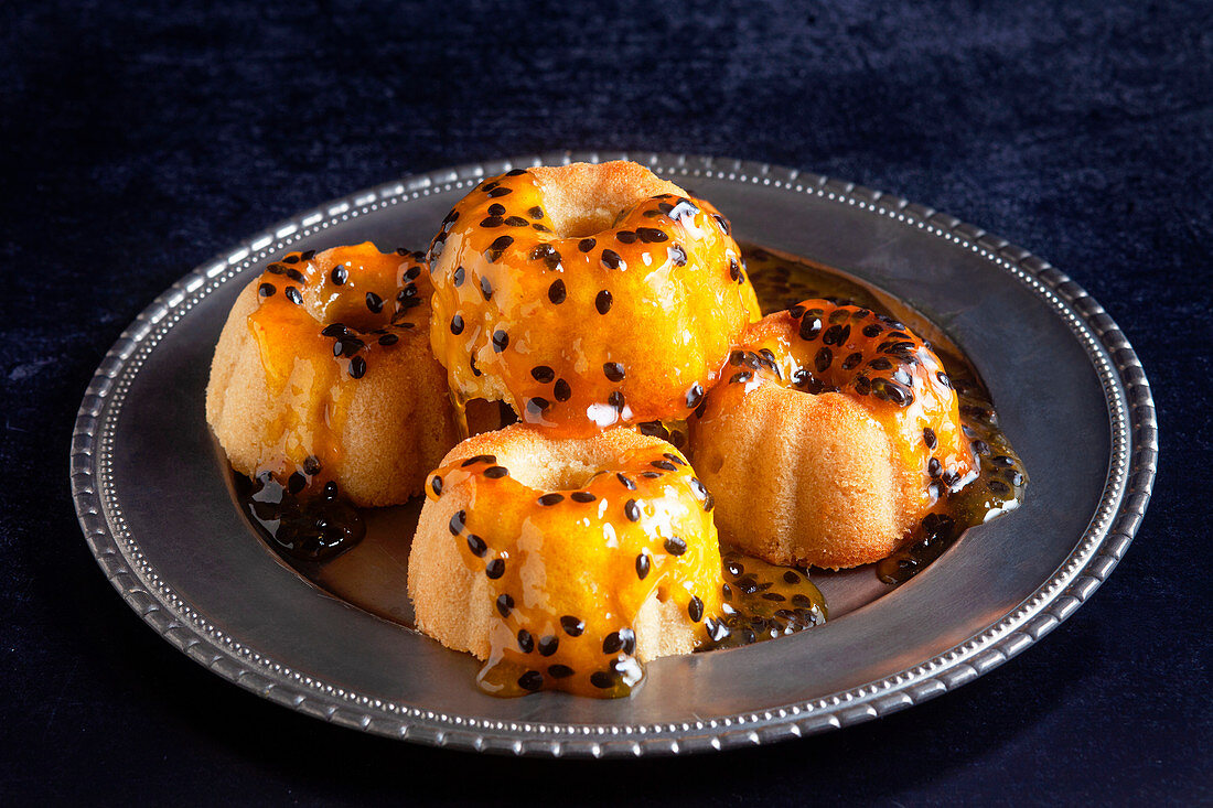 Lemon cakes with passion fruit syrup