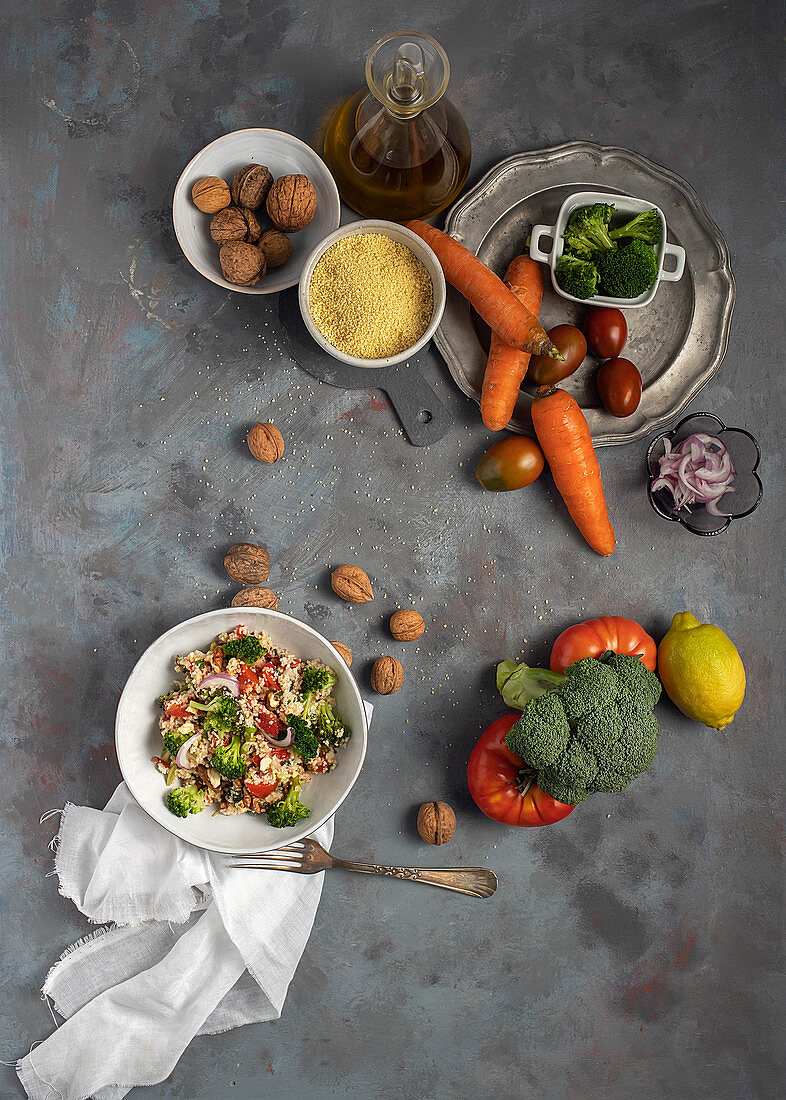 Bulgur couscous salad with various vegetables and walnuts
