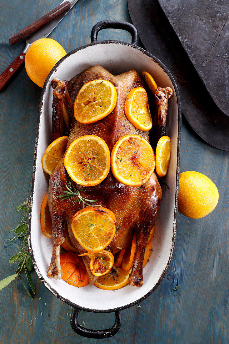 Baked goose with oranges