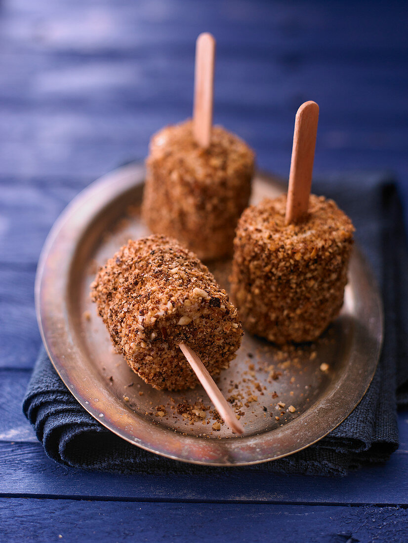 Crispy cheese croquettes on a stick