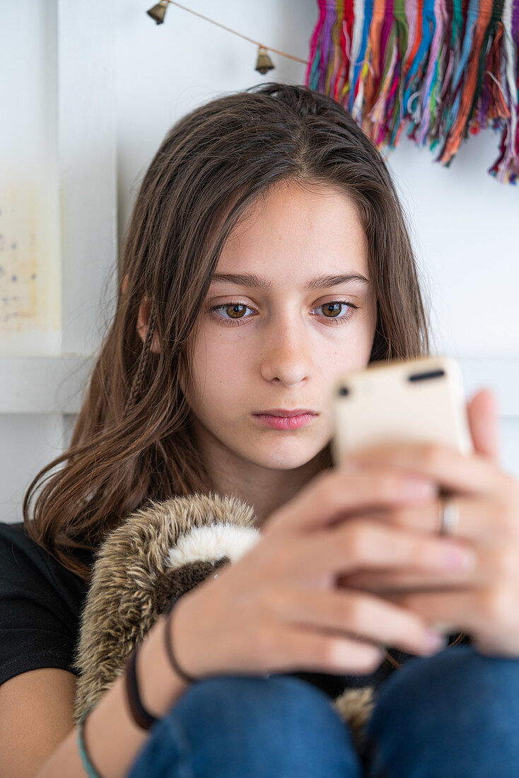 Teenage girl using a Smartphone