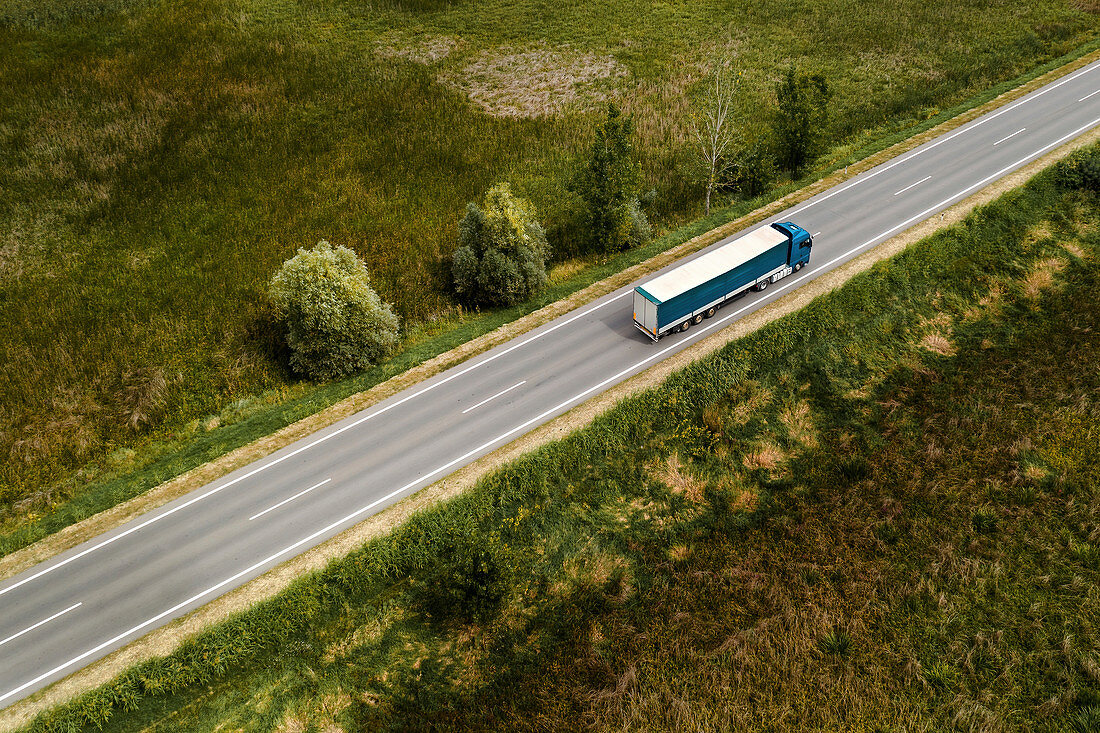 Large freight transporter semi-truck, aerial view