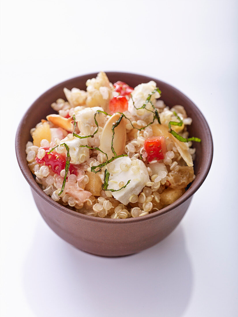 Quinoa salad with goat’s cheese, vegetables and almonds