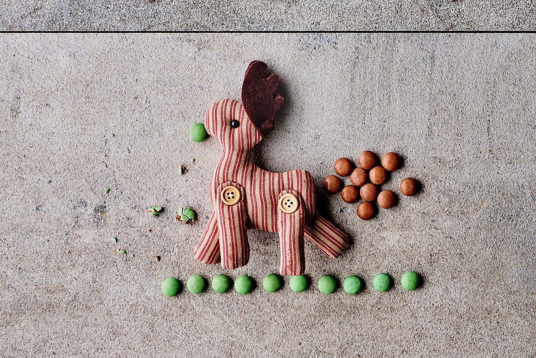 Smarties with a stuffed animal as decorations