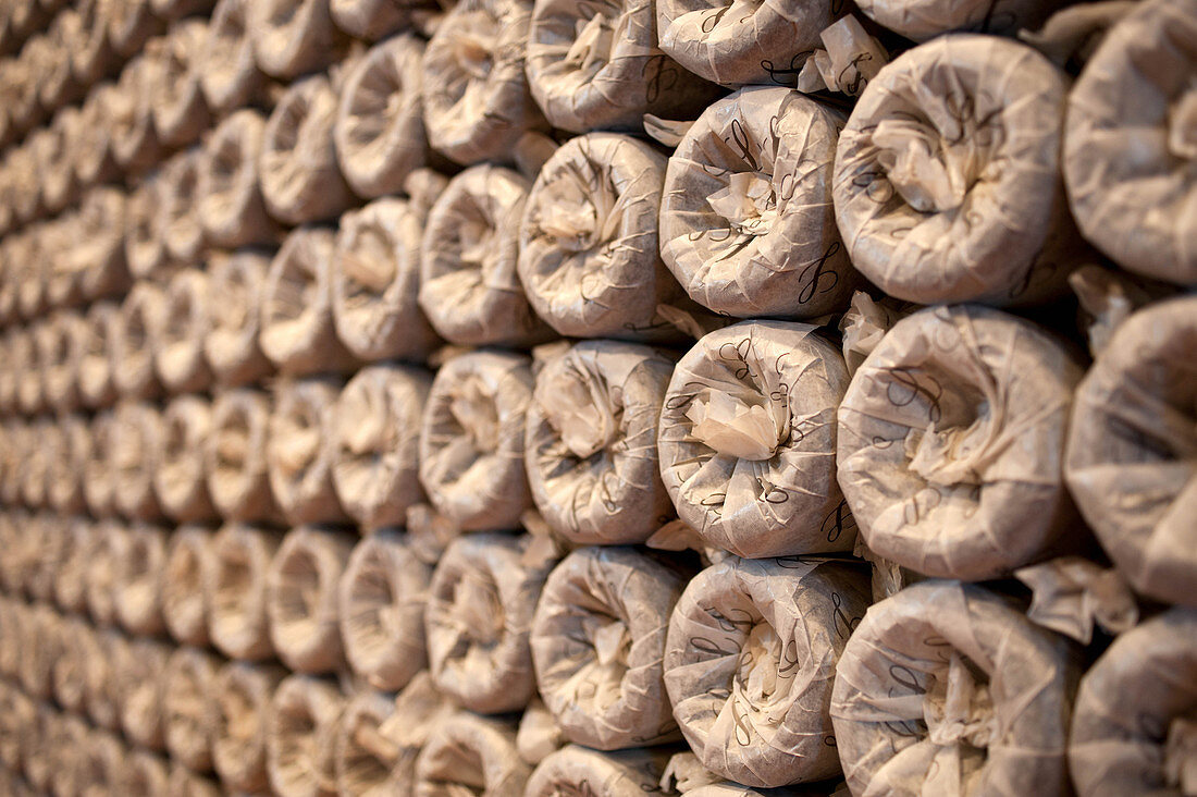 Wine bottles wrapped in tissue paper, Ladoucette, Loire, France