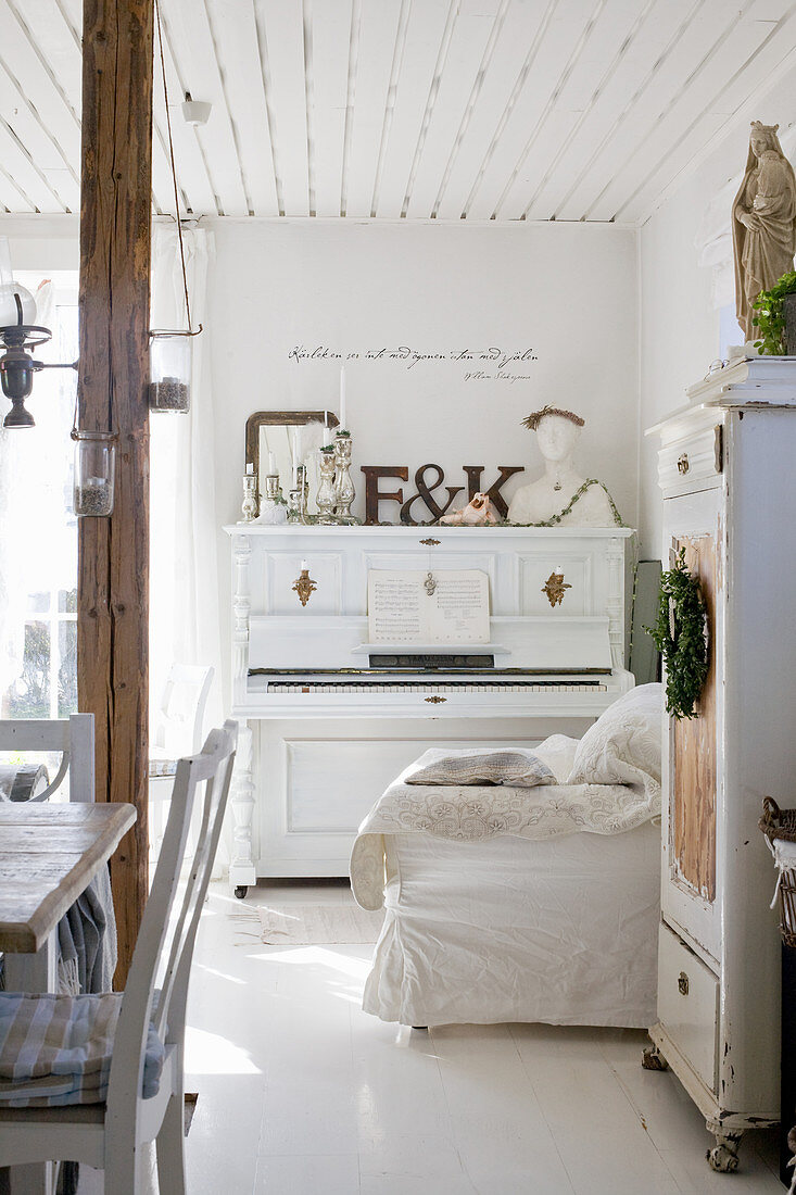 White piano in shabby-chic living room