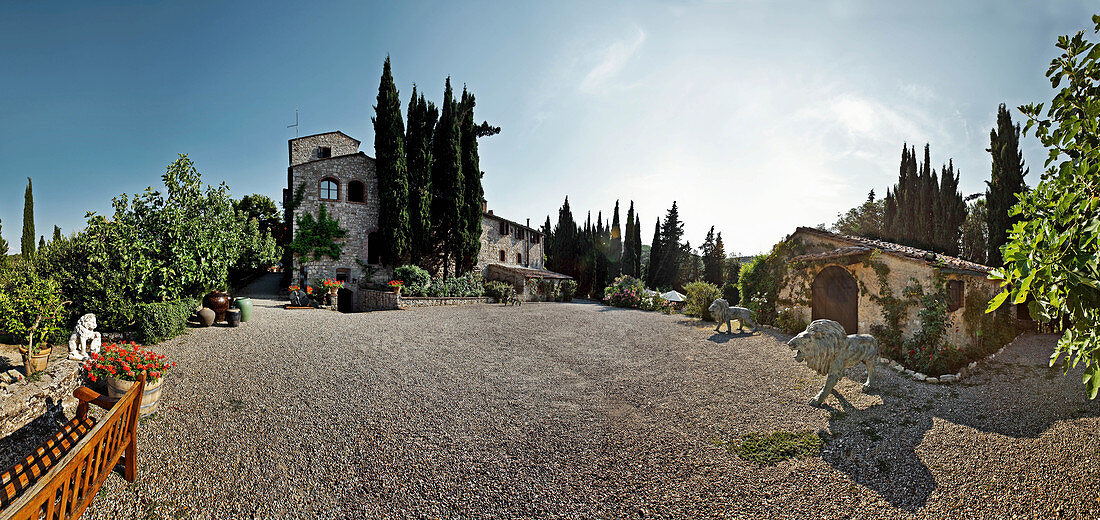Stone houses and a yard, Nittardi vineyard, Maremma, Tuscany, Italy