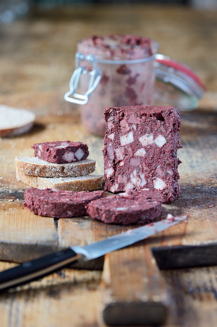 Tongue and heart black pudding made in a flip-top jar