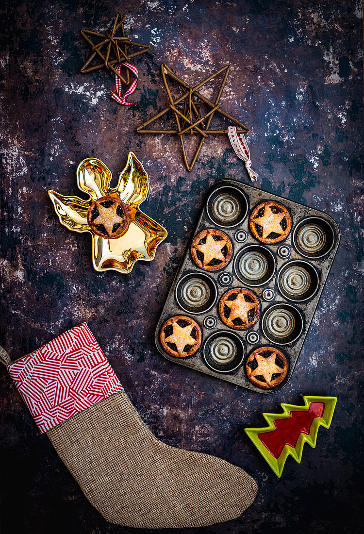 Mince Pies in baking tray with Christas Decorations