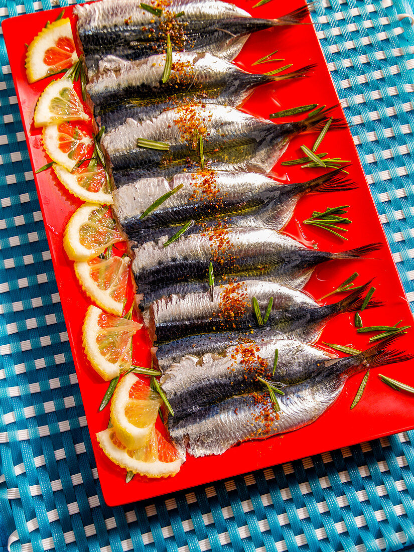 Marinated sardines with lemons and rosemary