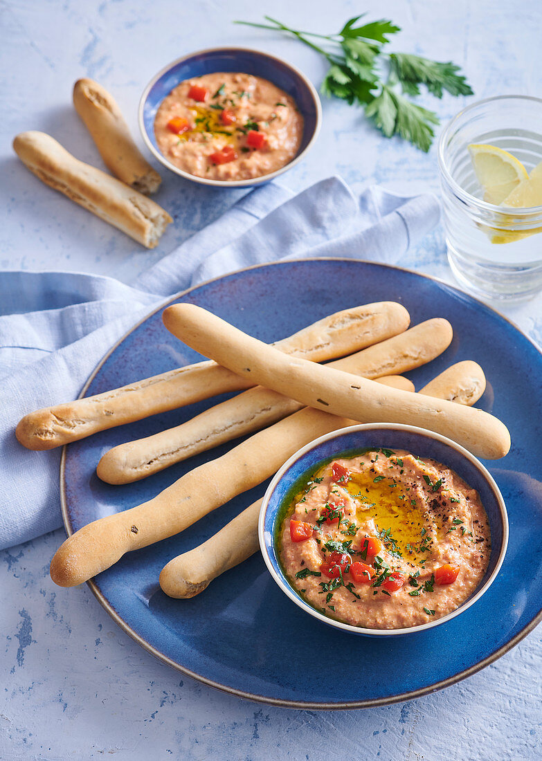 Hummus with baked red pepper and grissini
