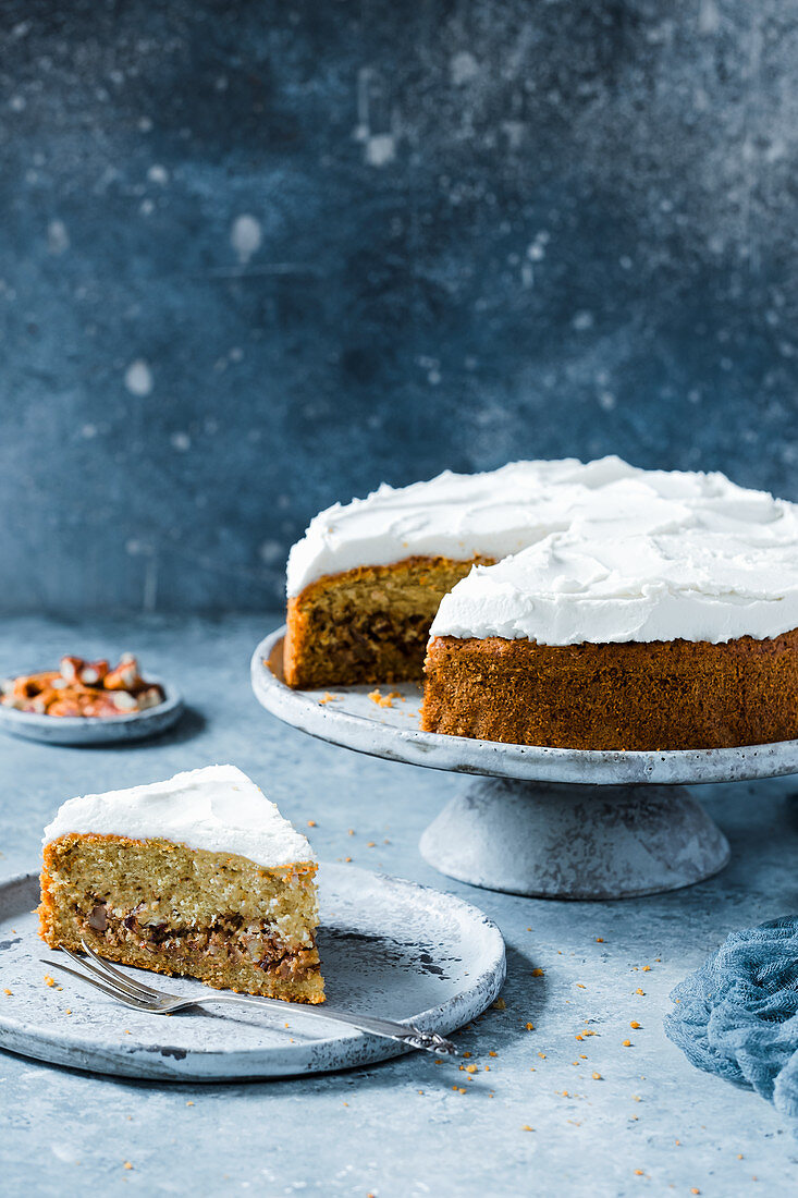 Gluten free pecan cake with frosting