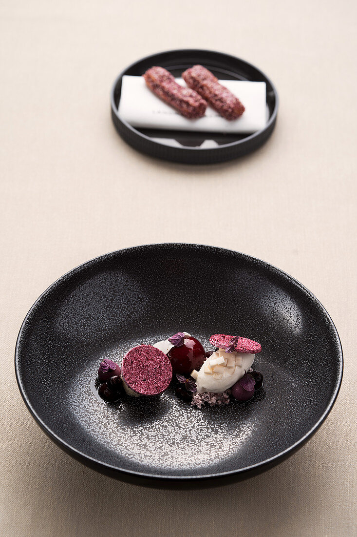 Dessert variations with redcurrants and coconut ice cream