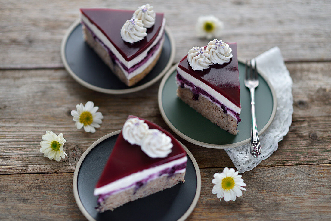 Vegan chestnut and blueberry cake with plant-based cream and fruit glaze