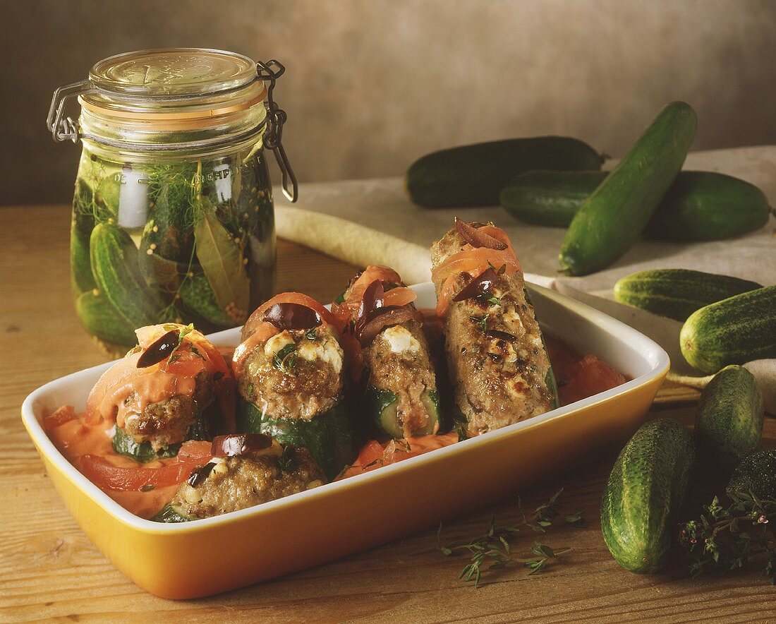 Stuffed cucumber in casserole dish & gherkins in jar