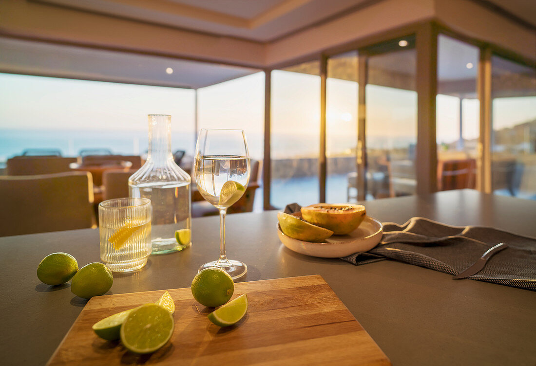 Water and limes on luxury home showcase kitchen counter