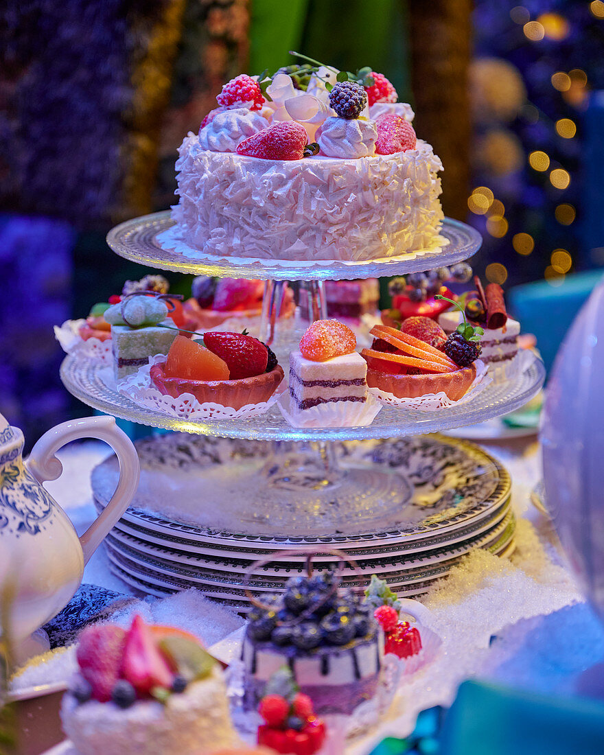Festively set table with a cake stand