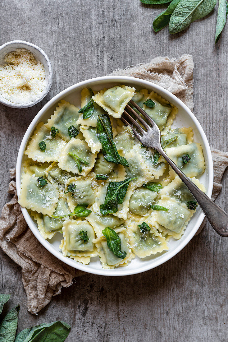 Herb ravioli with butter, sage and parmesan cheese