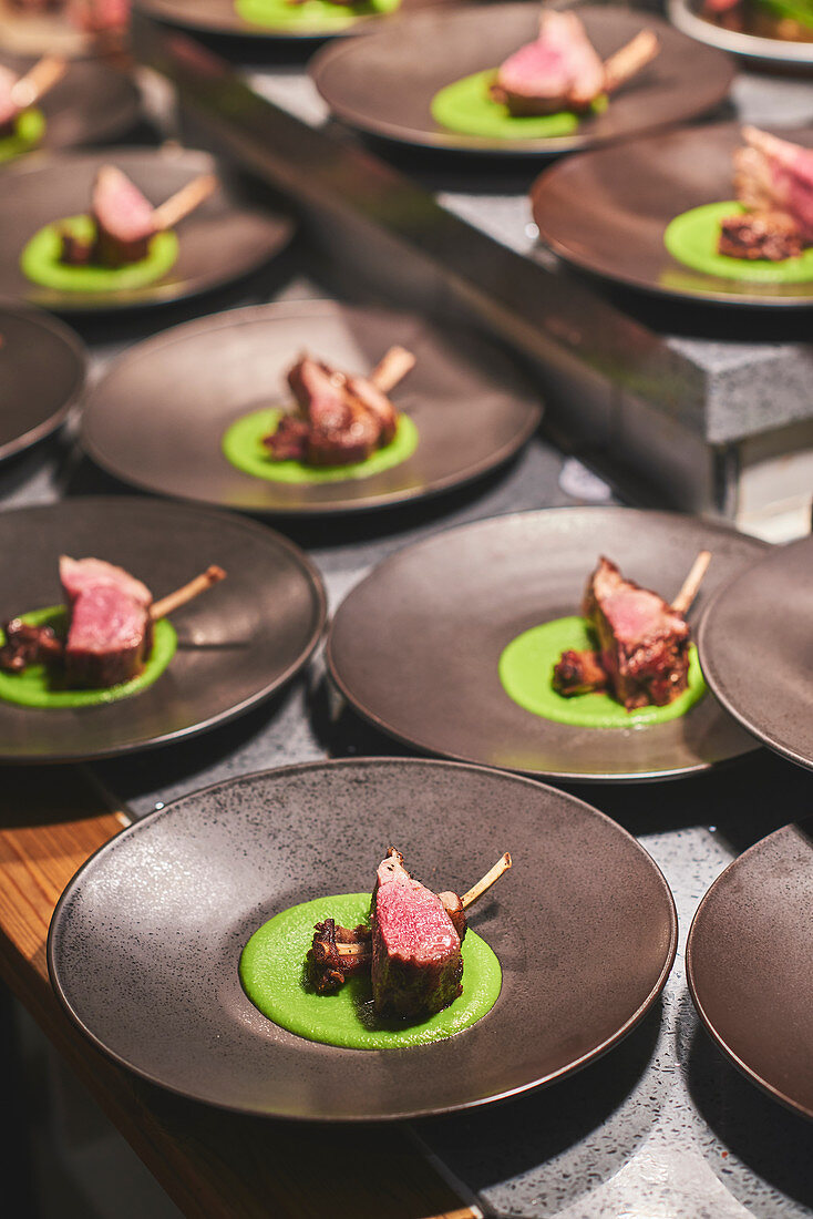 Chef preparing dishes in French restaurant