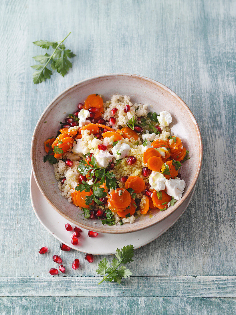 Couscous salad with turmeric carrots, feta and pomegranate seeds