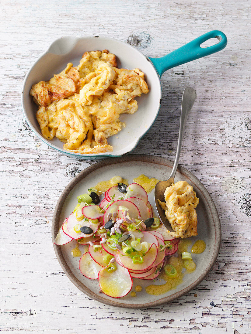 Scrambled eggs with radish salad