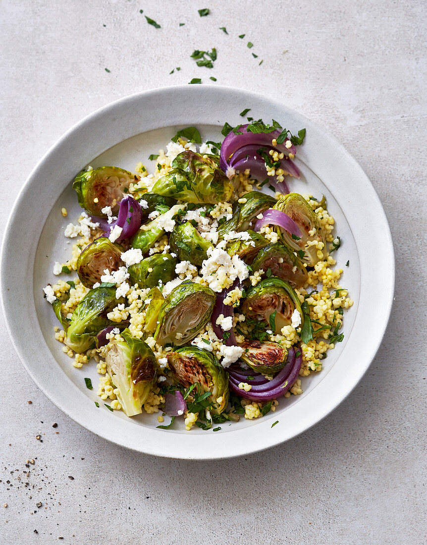 Warm brussels sprouts and millet salad with feta
