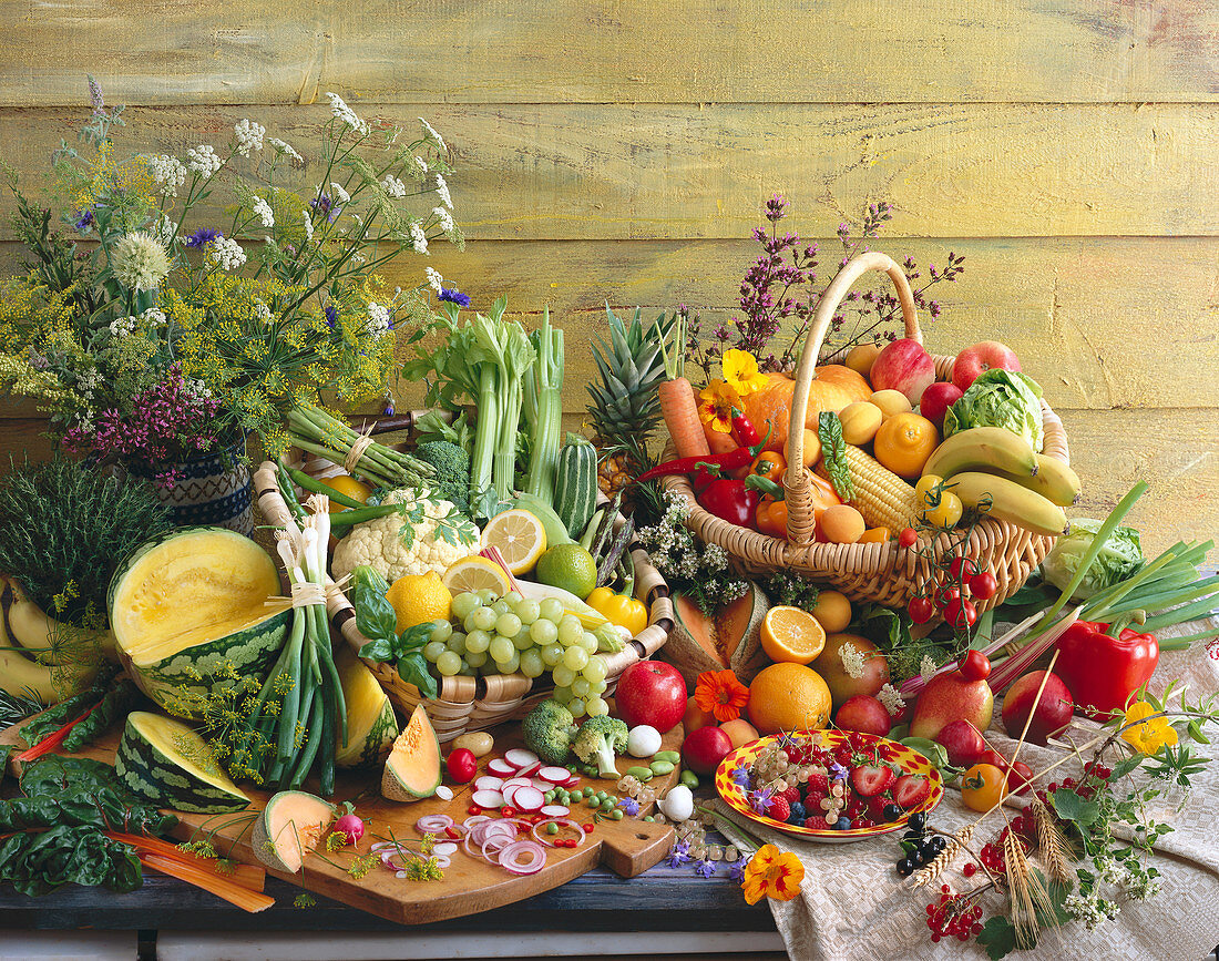 Still life with many different kinds of fruits and vegetables