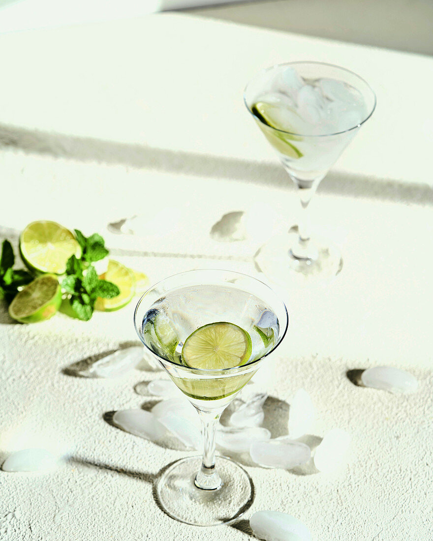 Mojito cocktail in glasses with lime slices